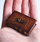 Miniature leather bound boo by The Gently Mad Bookbinder