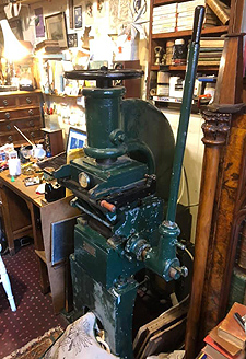 Large blocking press for gold foiling book covers and title labels
